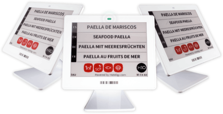 Tres etiquetas electrónicas para buffet hotelero con señalización digital en varios idiomas