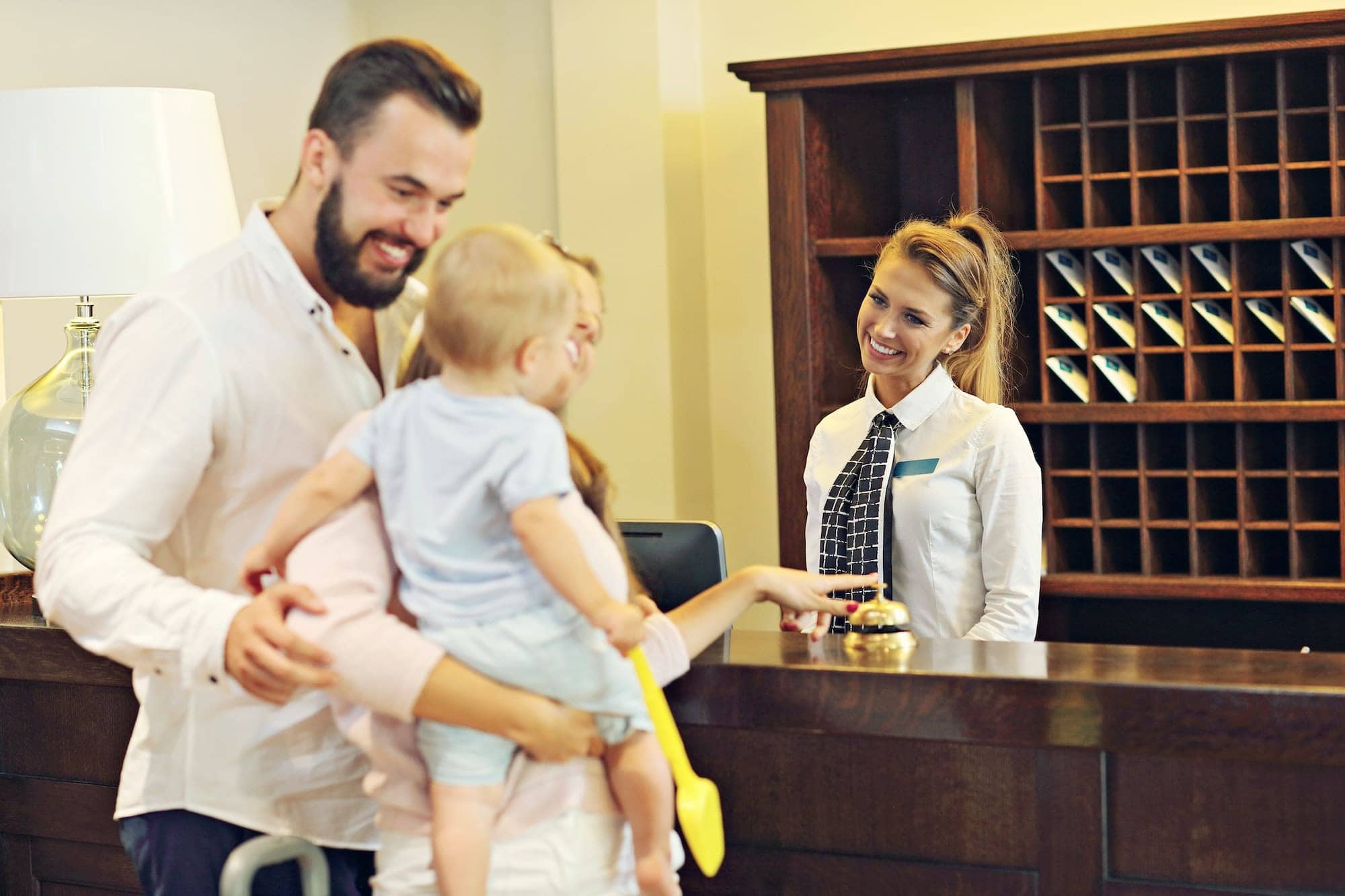 family checking in hotel